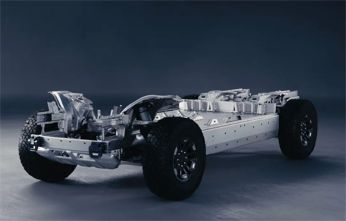 A Mercedes-Benz electric vehicle on the road, wrapped with 'SOLID STATE' branding, testing solid-state battery technology
